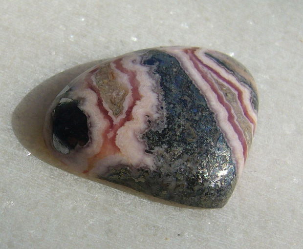 Rodocrozit cabochon aprox 26.5x21x6.4 mm