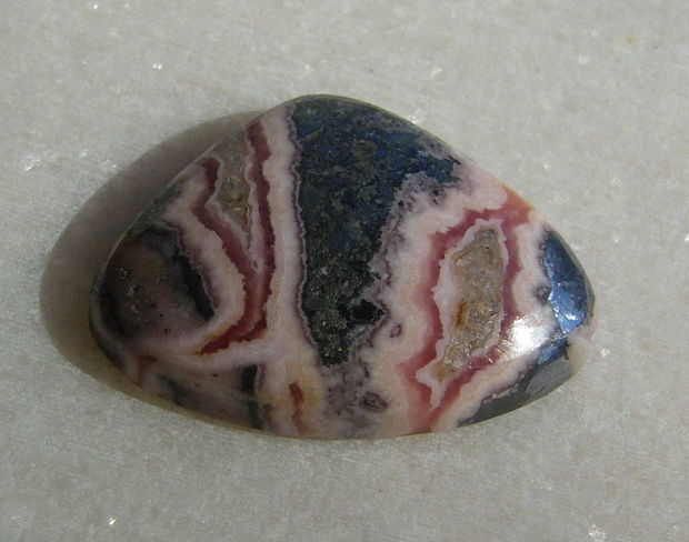 Rodocrozit cabochon aprox 26.5x21x6.4 mm