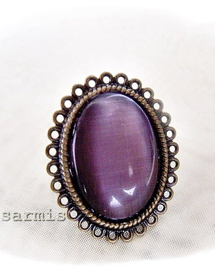 Inel vintage cu cabochon  ochi de pisica mov
