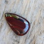 Cabochon ochi de tigru rosu. 30x18x6.5 mm