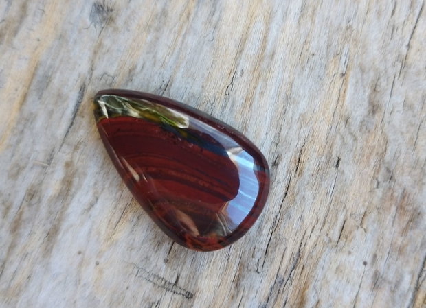 Cabochon ochi de tigru rosu. 30x18x6.5 mm