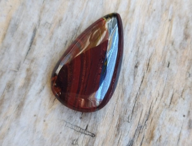 Cabochon ochi de tigru rosu. 30x18x6.5 mm