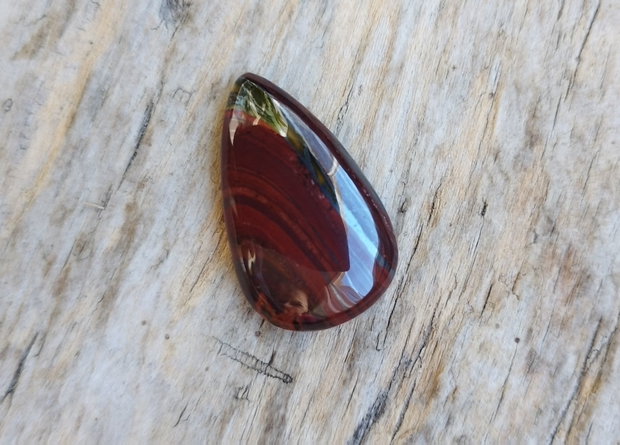 Cabochon ochi de tigru rosu. 30x18x6.5 mm