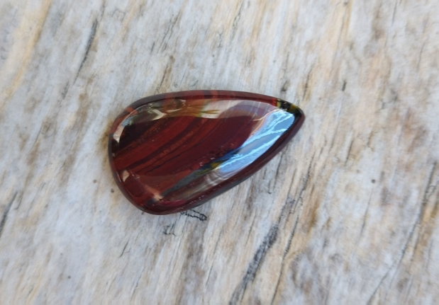 Cabochon ochi de tigru rosu. 30x18x6.5 mm