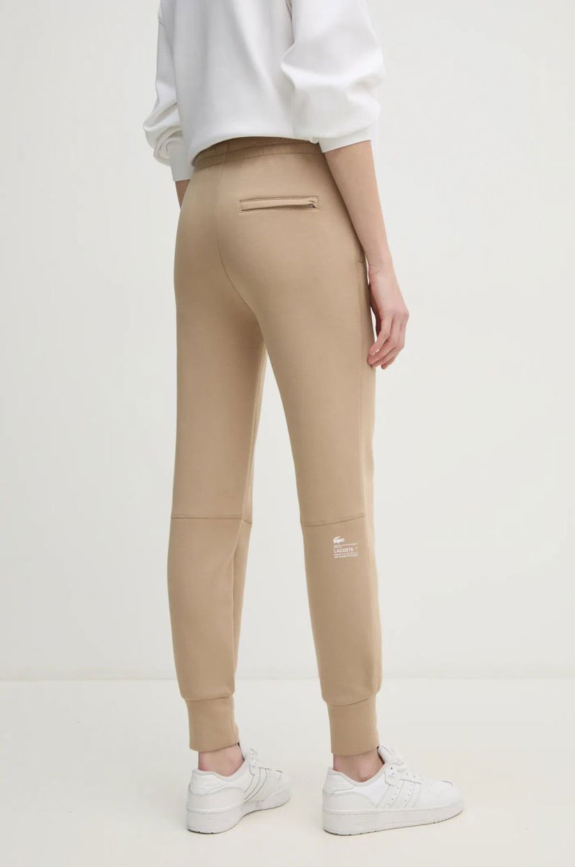 Lacoste pantaloni de trening culoarea bej, neted