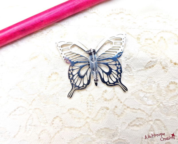 Brosa fluture cu onix
