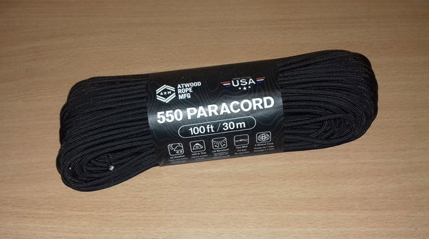 Brățară paracord USA negru cu portocaliu și trident din plastic