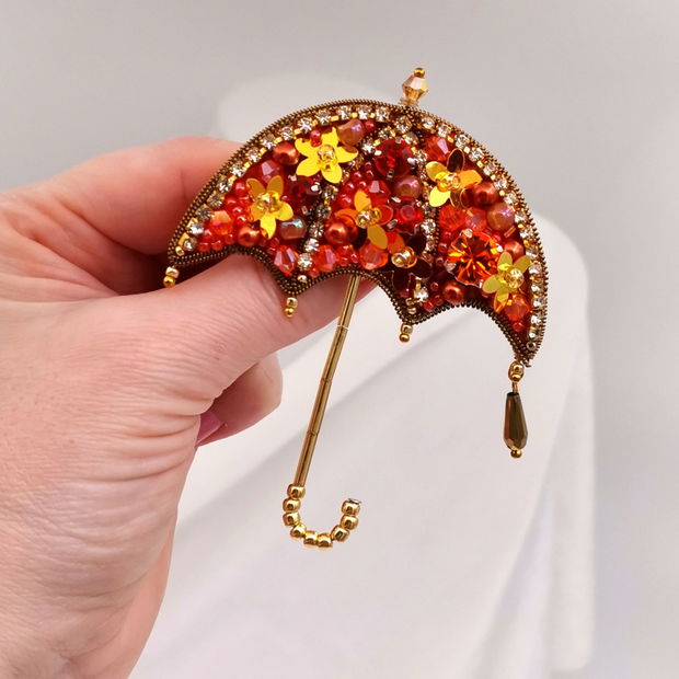 Rezervat Broșă umbrelă - Golden Sunset