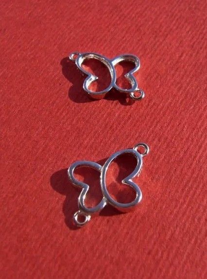 Fluturas - link din argint .925 rodiat aprox 10x17 mm (cu anourile)