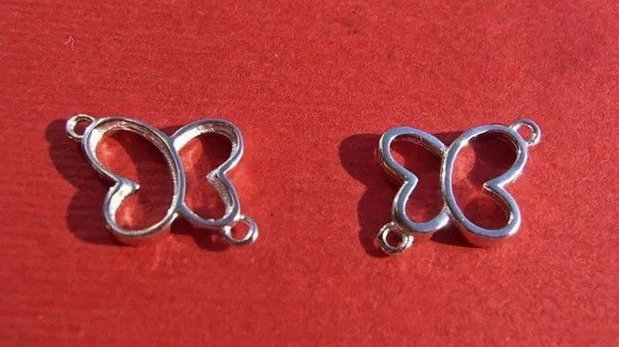 Fluturas - link din argint .925 rodiat aprox 10x17 mm (cu anourile)
