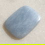 Angelit cabochon (lucrat manual in India) aprox 24x17.5x3 mm