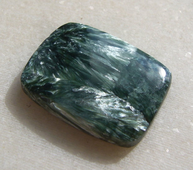 Serafinit cabochon aprox 28.4x21.4x5 mm