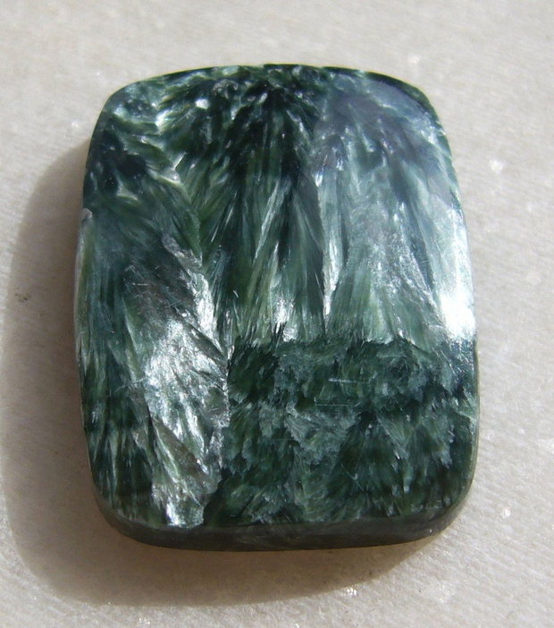 Serafinit cabochon aprox 28.4x21.4x5 mm