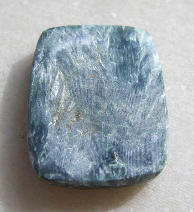 Serafinit cabochon aprox 28.4x21.4x5 mm
