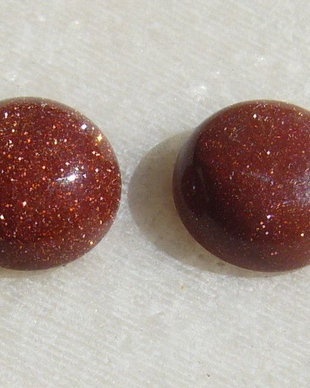 (2 bucati) Brown goldstone cabochon aprox 10x5 mm