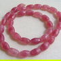 Agate zmeuriu deschis butoiase fatetate aprox 10x6.5 mm