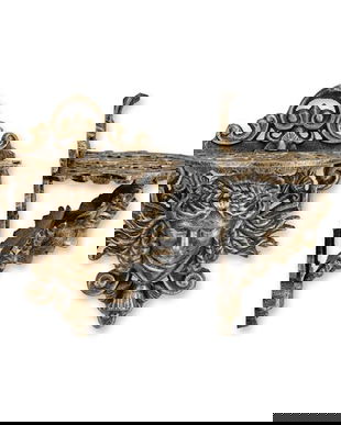 Consolă de perete din fontă cu cap de femeie