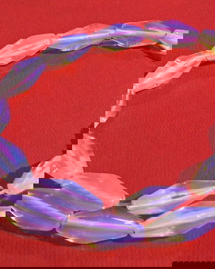 Opalit cu fațete de aprox 16x12 mm - sirag de 35 cm (22 bucati) fara inchizatoare