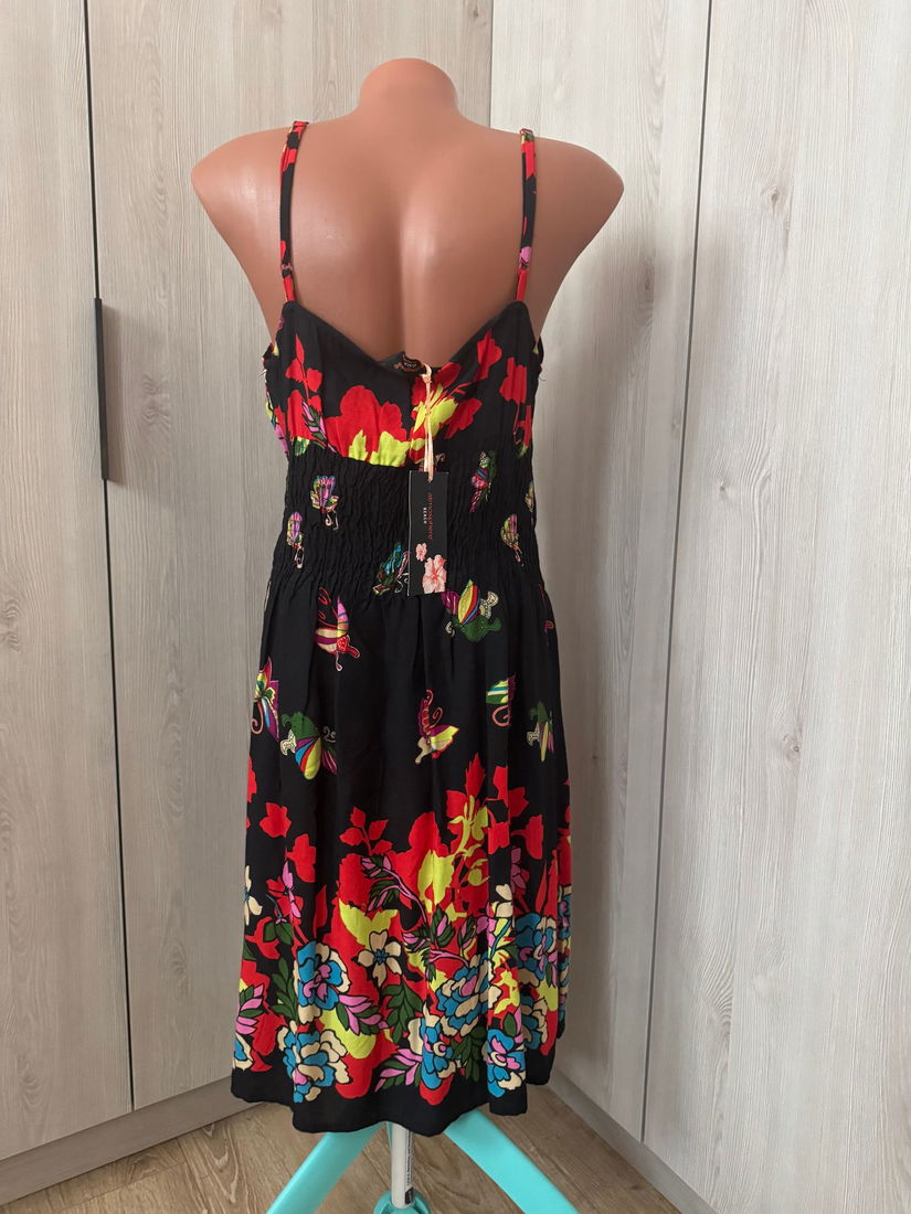 ROCHIE  NOUA ATMOSPHERE RAYON MARIME 40-42 FOARTE FRUMOASA