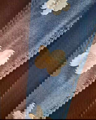 Blugi elastici cu aplicații