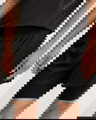 Puma pantaloni scurți de antrenament PUMA x HELIOT EMIL culoarea negru, 629492