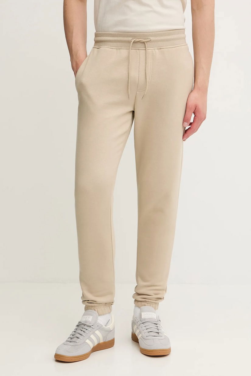 Tommy Jeans pantaloni de trening culoarea bleumarin, uni, DM0DM20473