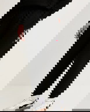 Tommy Jeans pantaloni de trening din bumbac culoarea negru, cu imprimeu, DM0DM22145