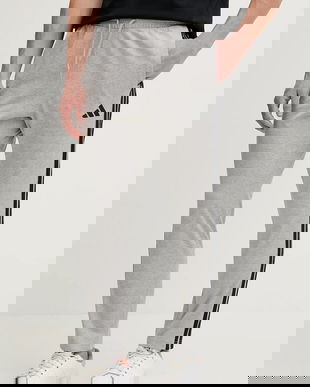 adidas pantaloni de trening Essentials culoarea gri, melanj, JE6428