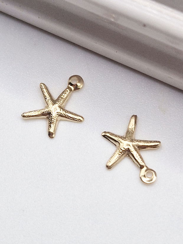 Charm stea de mare 7.5mm aur filat - 1 buc