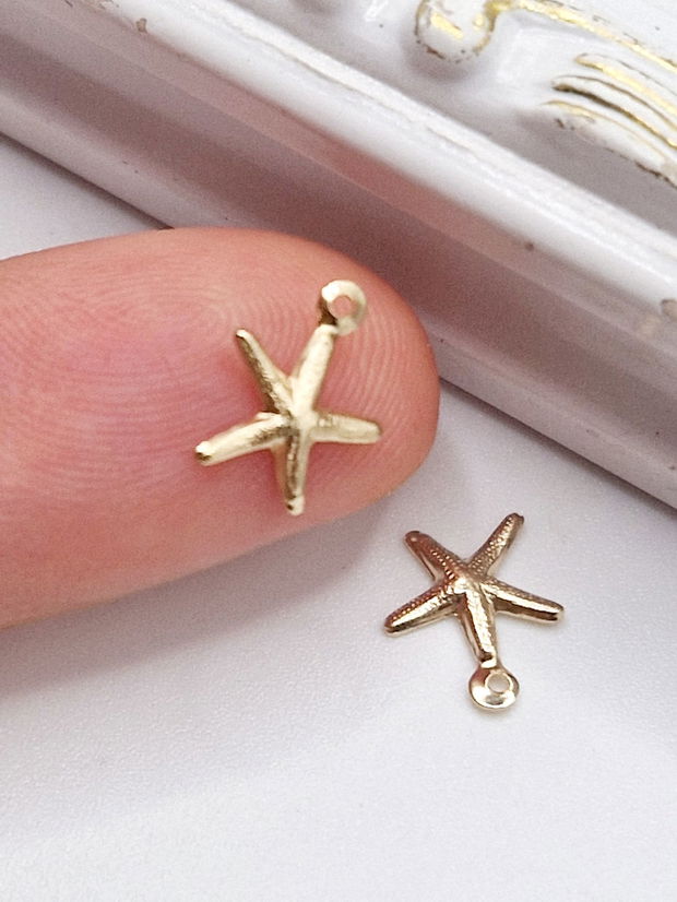 Charm stea de mare 7.5mm aur filat - 1 buc