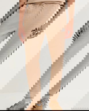 adidas pantaloni de trening Essentials culoarea bej, cu imprimeu, JX0712