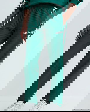 adidas Originals pantaloni de trening Track Pant culoarea verde, cu imprimeu, JX3055