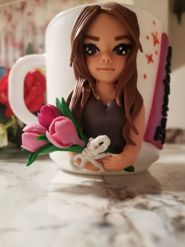 Cana figurina stilizata