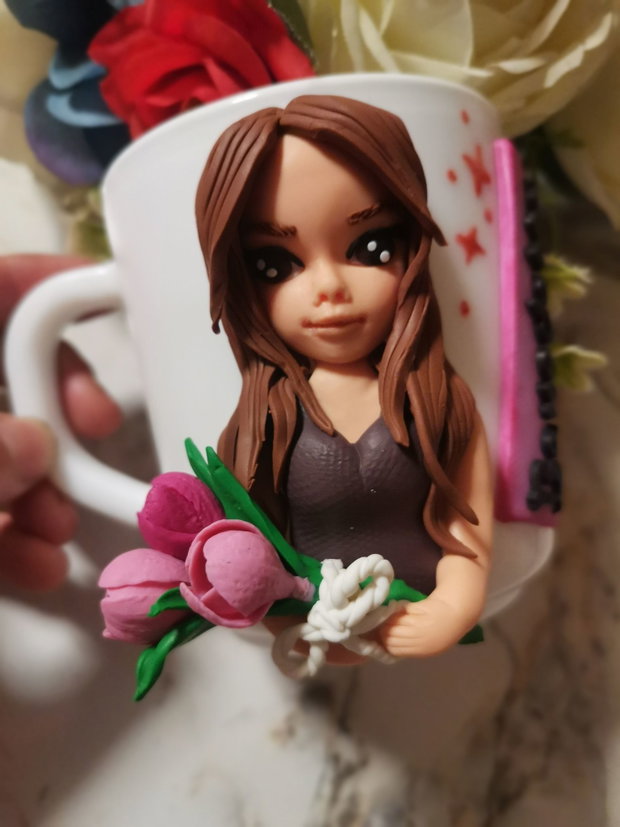 Cana figurina stilizata