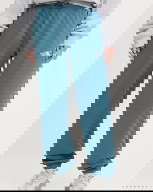 The North Face pantaloni de trening Essential Relaxed culoarea turcoaz, uni, NF0A8C1GBQ51