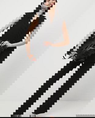 Medicine vestă culoarea negru, cu două rânduri de nasturi