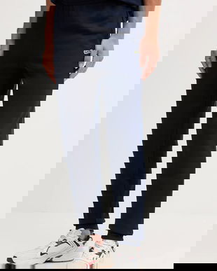 Lacoste pantaloni de trening din bumbac culoarea bleumarin, uni, XH9833