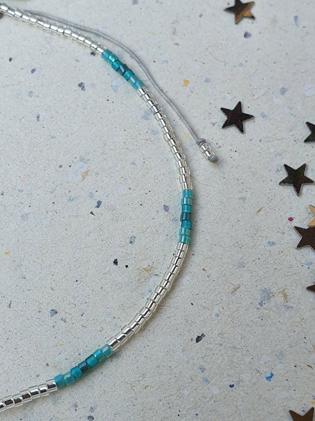 Anklet gri / turcoaz cu charm steluță de mare
