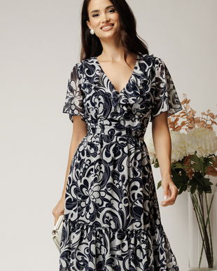 Rochie midi alba din voal cu imprimeu bleumarin si volane