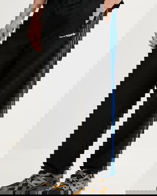 adidas Originals pantaloni de trening Brushed WVN culoarea negru, cu imprimeu, JX3078