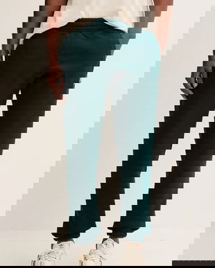 adidas Originals pantaloni de trening Trefoil Essentials culoarea verde, uni, JZ3585