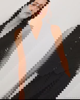 Medicine vesta culoarea negru, un singur rand de nasturi