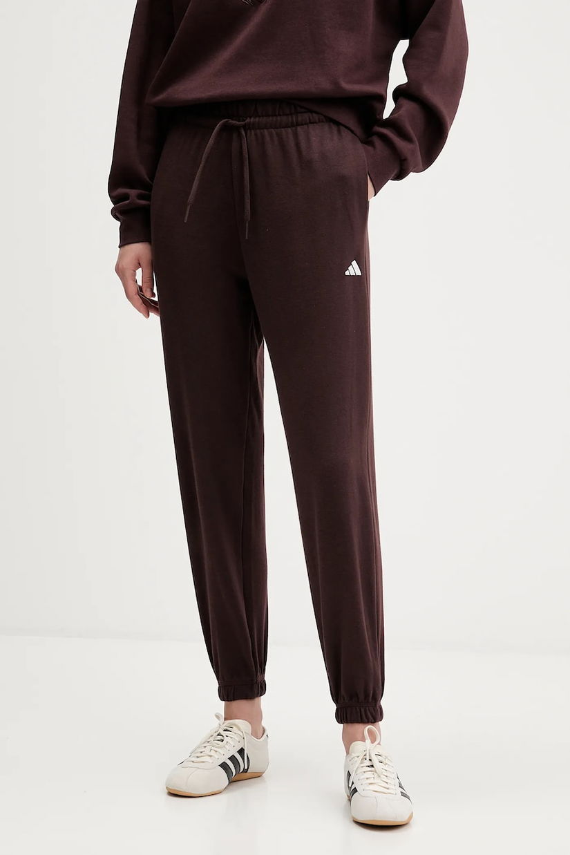 adidas pantaloni de trening Essentials culoarea maro, cu imprimeu, JX3864
