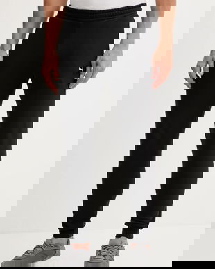 Puma pantaloni de trening din bumbac culoarea negru, cu imprimeu, 688277