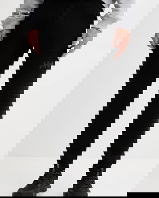 Helly Hansen pantaloni de trening culoarea albastru marin, cu imprimeu