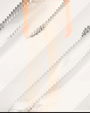 MUUV. pantaloni de trening MUUV..x.Answear culoarea bej, uni