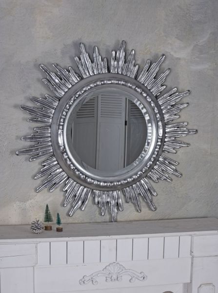 Oglinda din cristal cu un soare argintiu