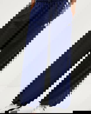 adidas pantaloni de trening Essentials culoarea bleumarin, cu imprimeu, JV5328