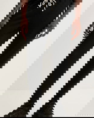 Nike pantaloni de trening Dri-Fit SI Taper Pant culoarea negru, cu imprimeu, 03B0-00A-8G-JK2