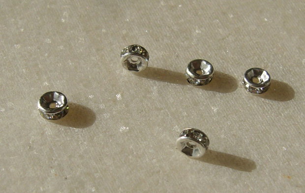 (10 bucati) Distantiere rhinestone argintii 4x2 mm cu cristale culoare cristal-clear